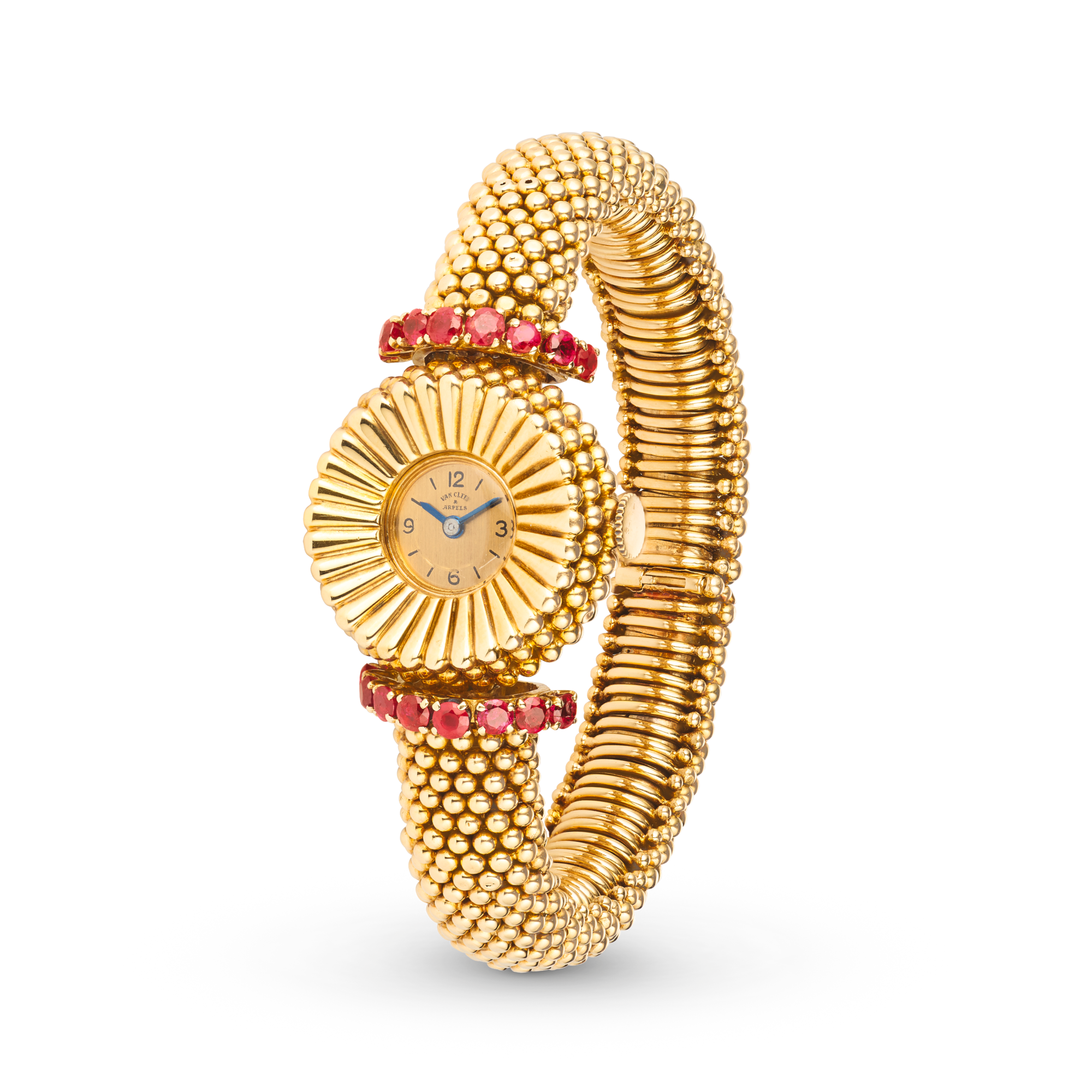 Couscous wristwatch, 1949
Yellow gold and rubies
Van Cleef & Arpels Collection