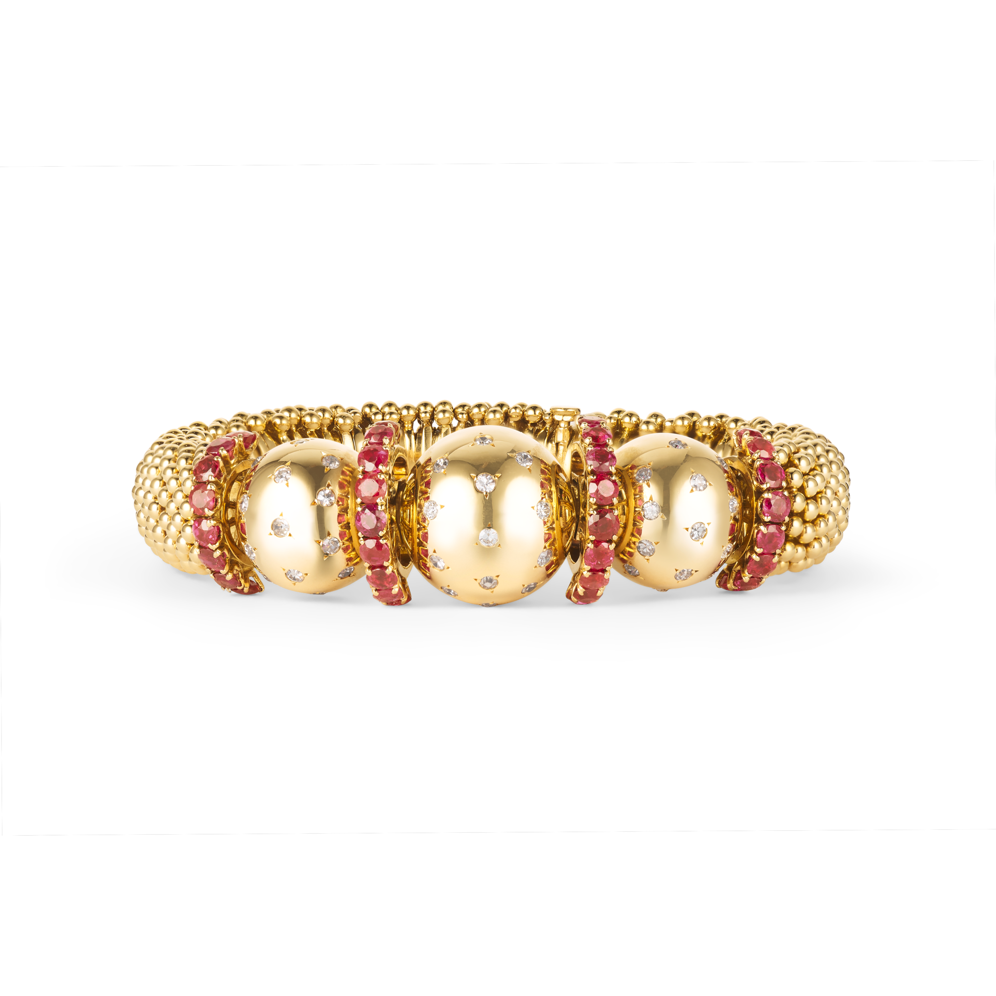 14 Juillet Couscous bracelet, 1950
Yellow gold, rubies, and diamonds
Van Cleef & Arpels Collection