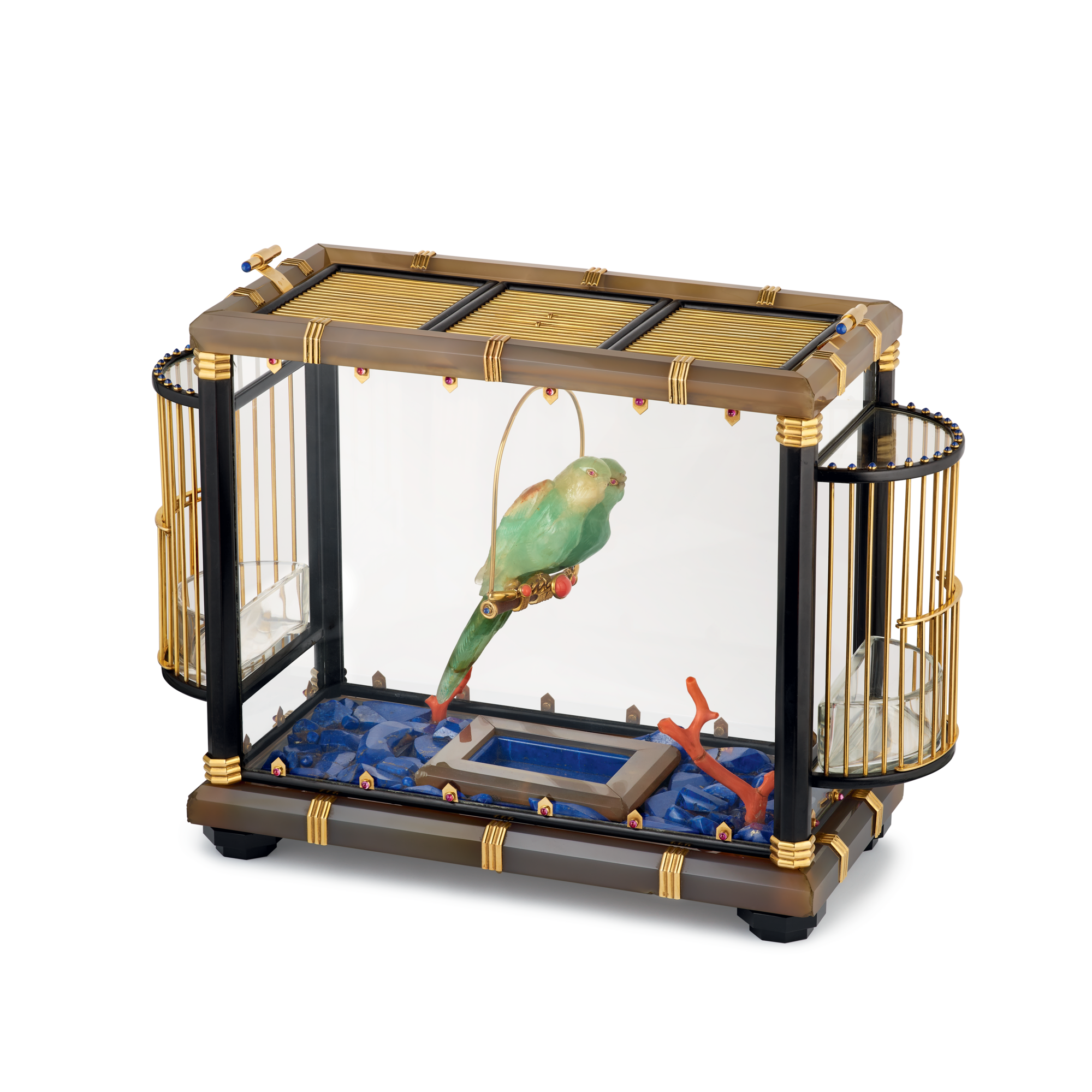 Bird cage, 1935
Yellow gold, rubies, sapphires, beryl, agate, lapis lazuli, glass, coral, enamel, and wood
Van Cleef & Arpels Collection