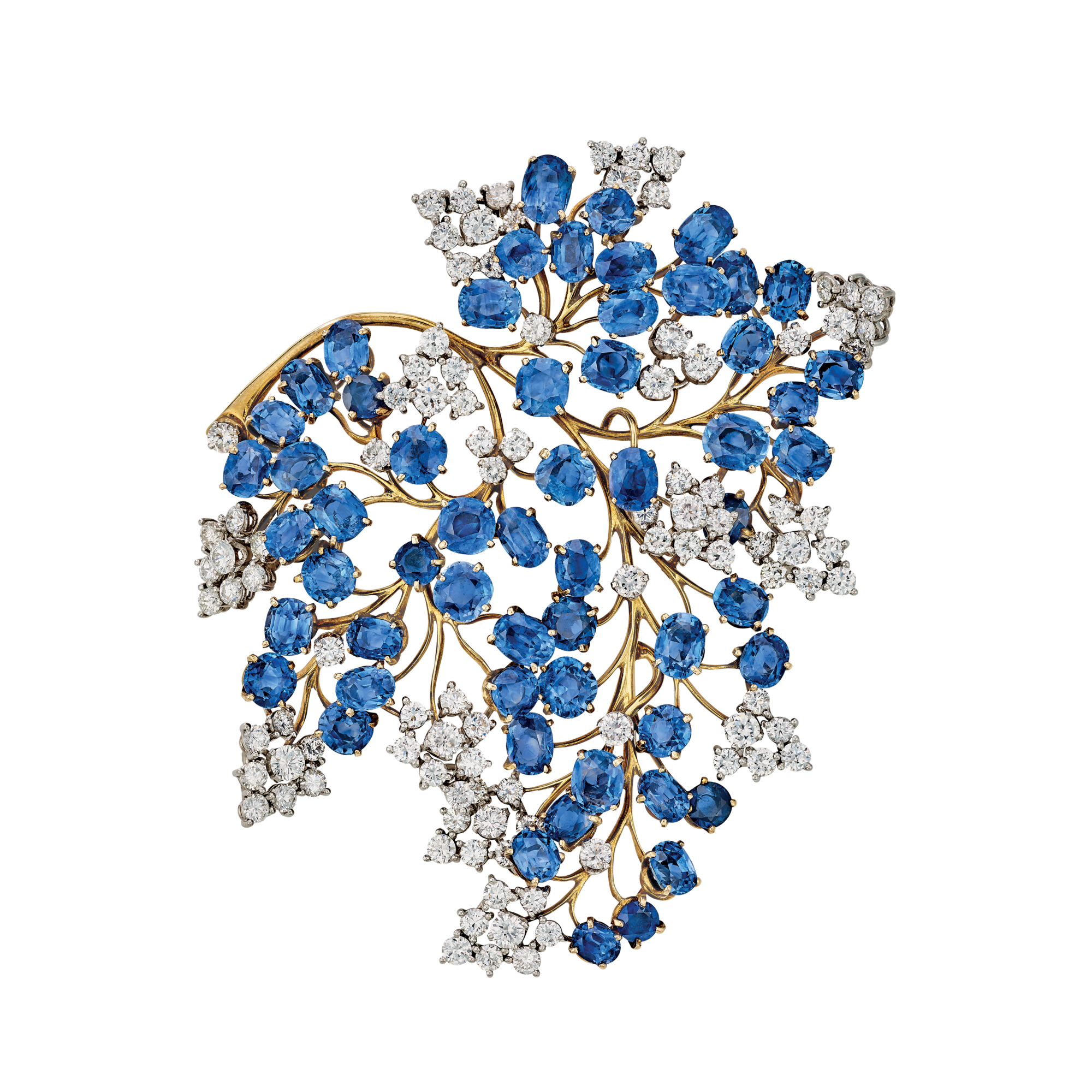 Fern clip, 1947
Platinum, yellow gold, sapphires, and diamonds
Van Cleef & Arpels Collection