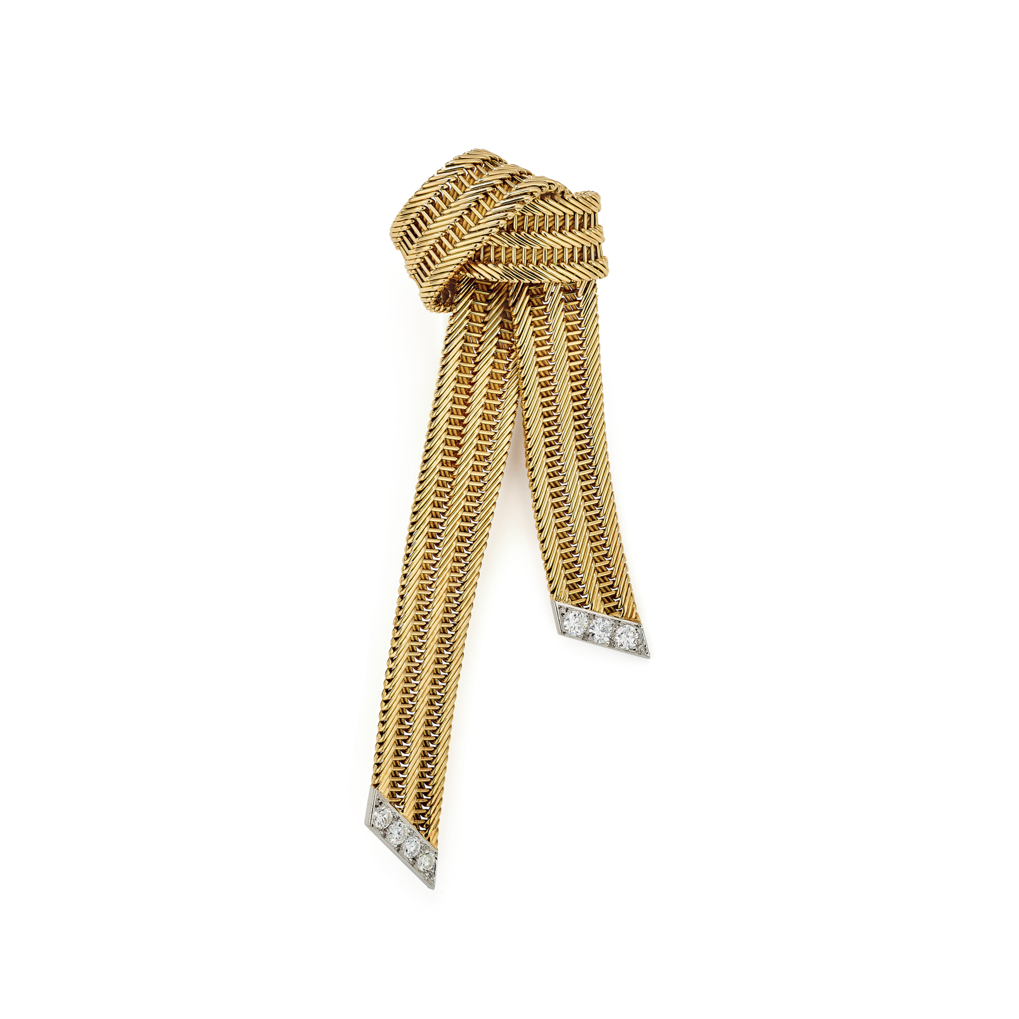 Serge fabric bow clip, 1954
Platinum, yellow gold, pink gold, diamonds
Van Cleef & Arpels Collection