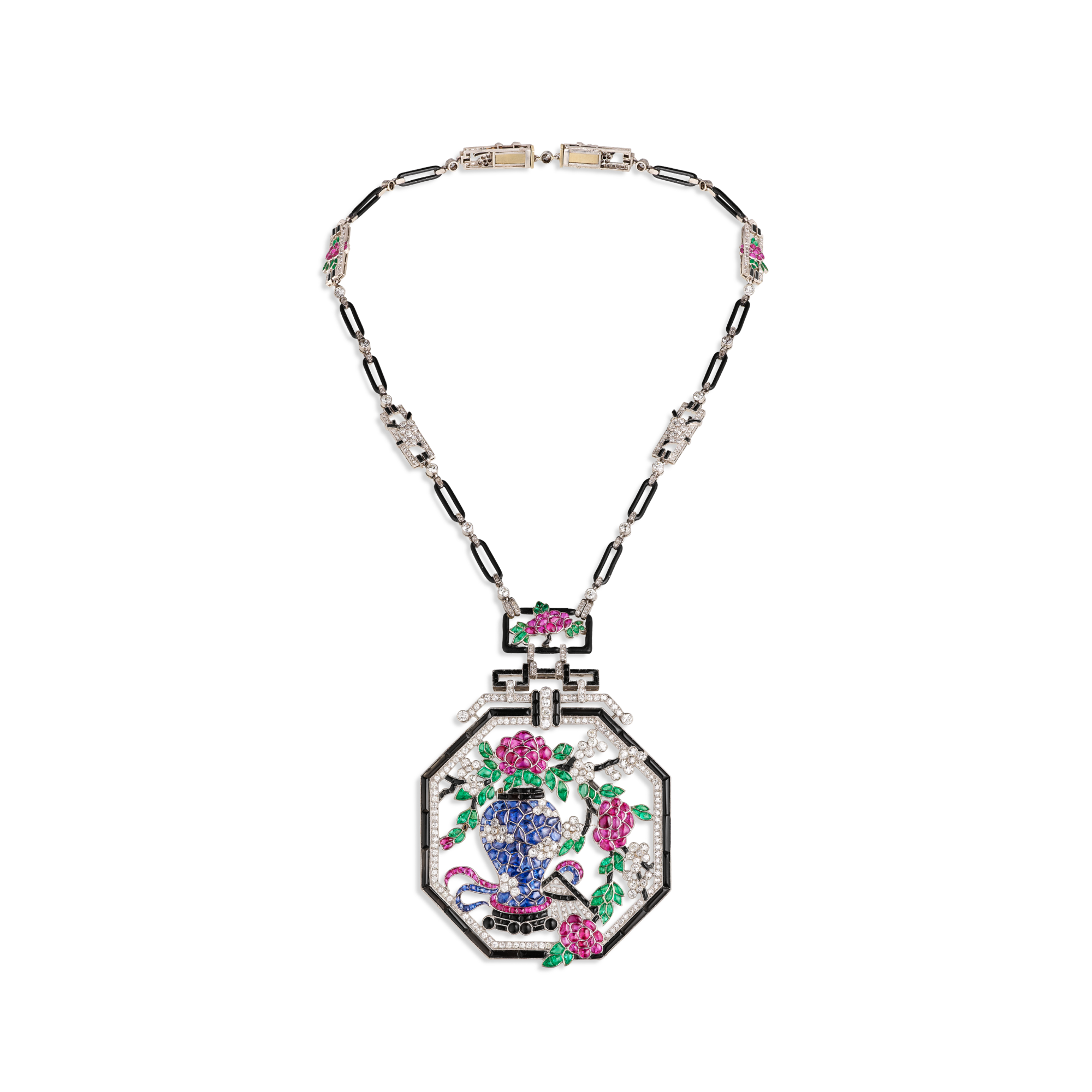 Long necklace, 1924
Can be worn longer
Platinum, emeralds, rubies, sapphires, onyx, enamel, and diamonds
Van Cleef & Arpels Collection