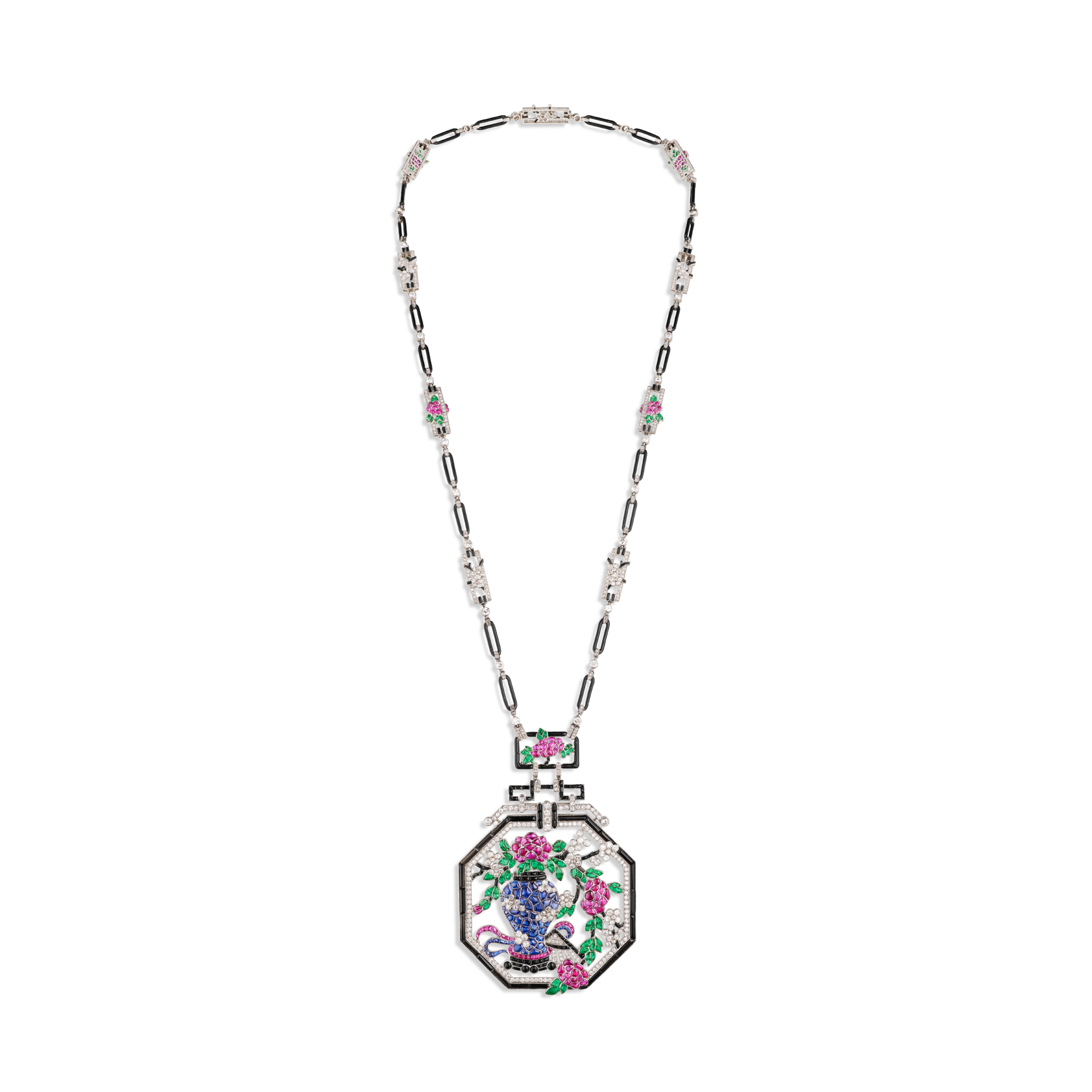 Long necklace, 1924
Can be worn longer
Platinum, emeralds, rubies, sapphires, onyx, enamel, and diamonds
Van Cleef & Arpels Collection