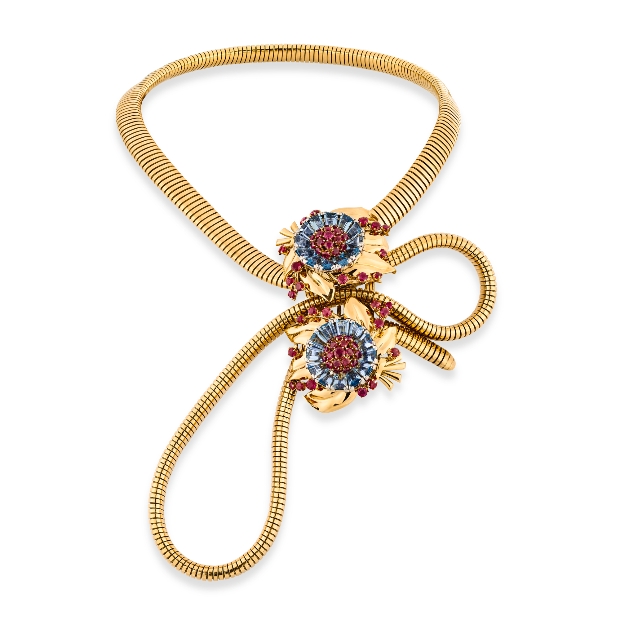 Passe-Partout jewelry, 1939
Convertible into a necklace, a bracelet, a belt or detachable clips
Yellow gold, rubies, and aquamarines
Van Cleef & Arpels Collection