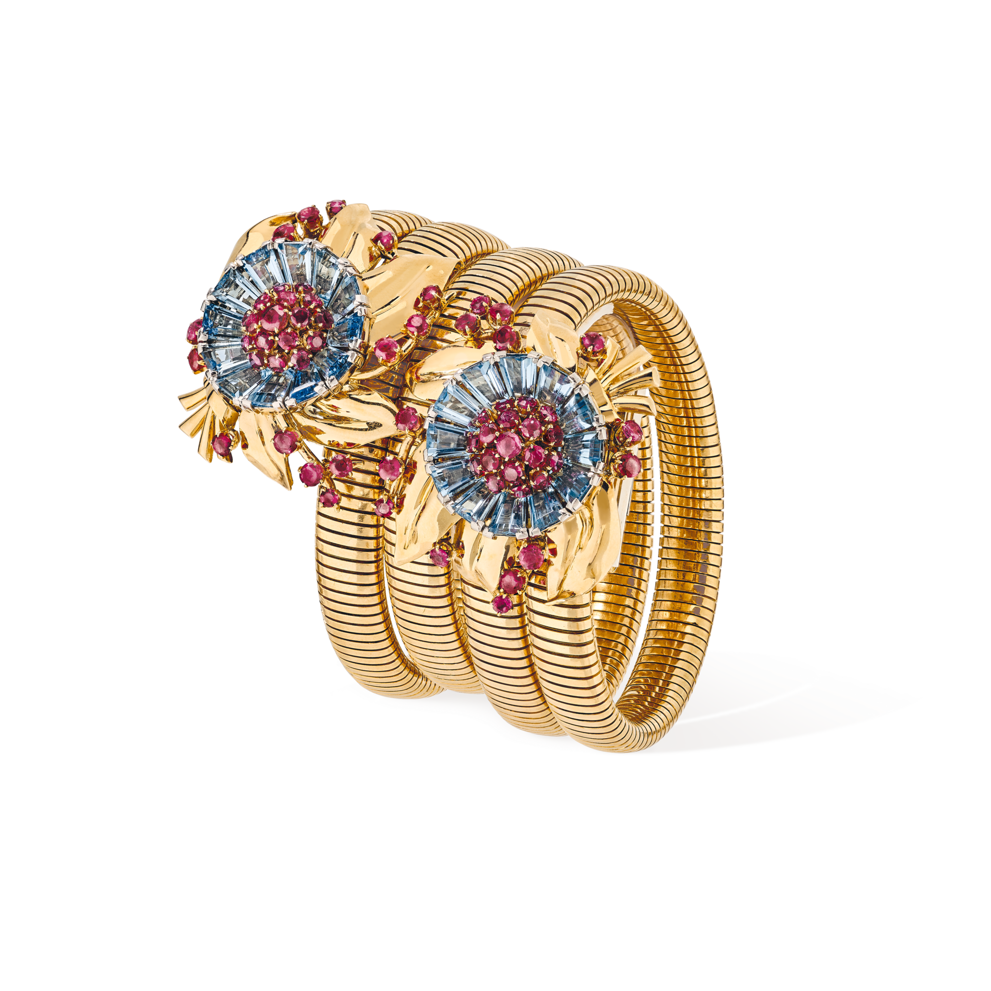 Passe-Partout jewelry, 1939
Convertible into a necklace, a bracelet, a belt or detachable clips
Yellow gold, rubies, and aquamarines
Van Cleef & Arpels Collection