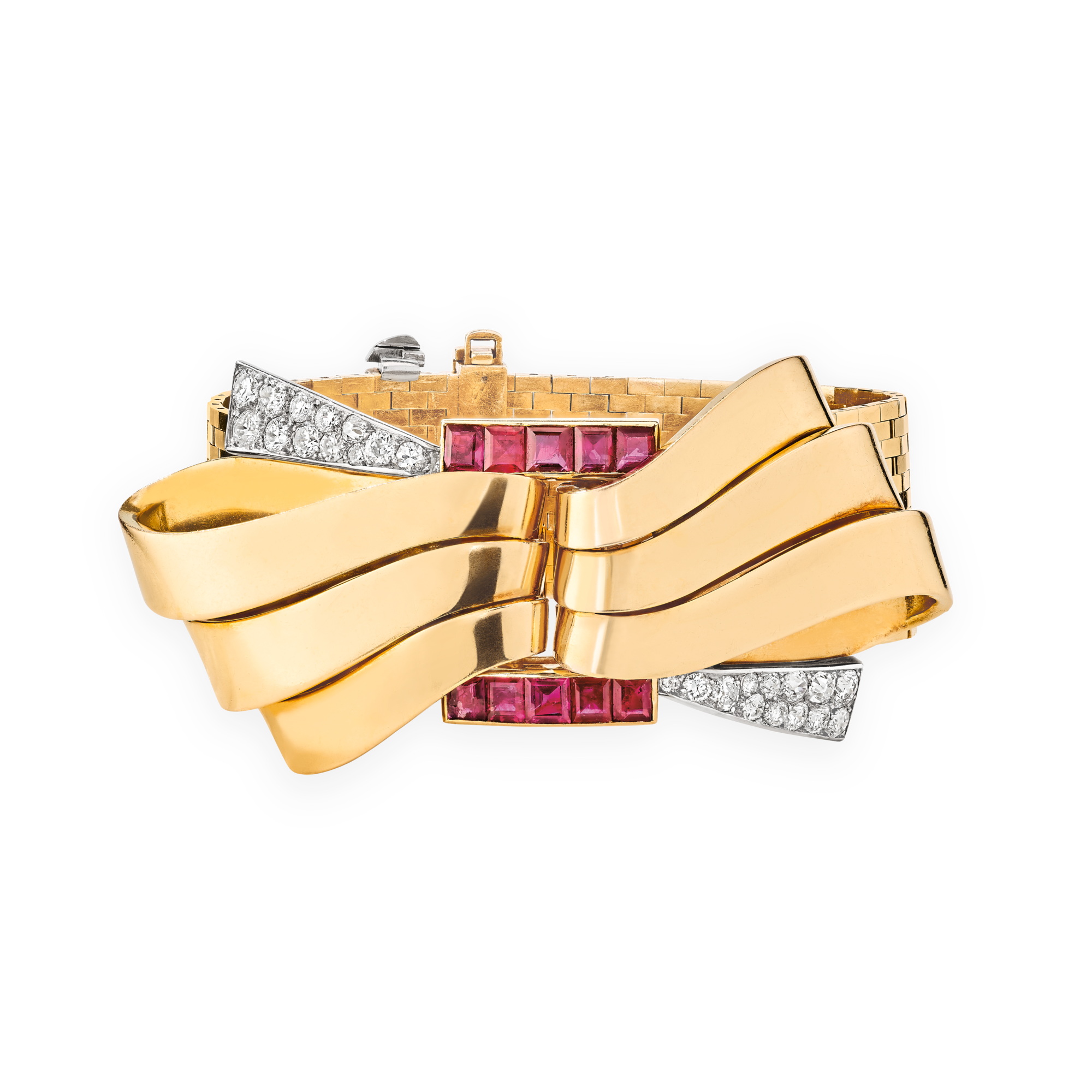 Ludo bracelet, 1937
Convertible into two clips
Platinum, yellow gold, rubies, and diamonds
Van Cleef & Arpels Collection