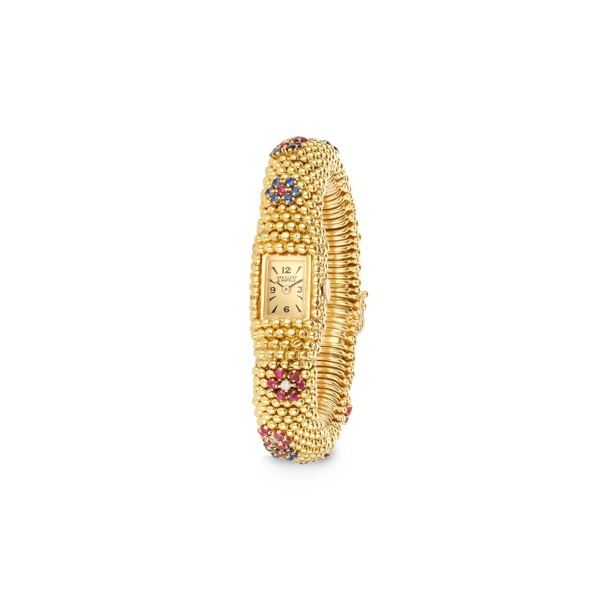 Bagatellle Couscous wristwatch, circa 1950
Yellow gold, rubies, sapphires, diamonds
Van Cleef & Arpels Collection